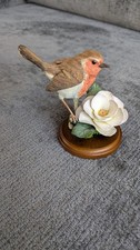 Robin with Camellia Figure