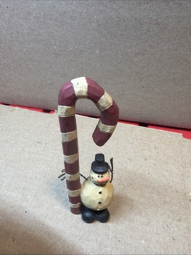 Snowman hugging candy - candy, cane