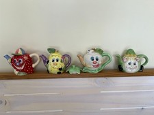 4 ORNAMENTAL TEAPOTS