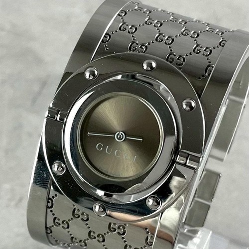 Gucci twirl quartz brown dial - gucci,
