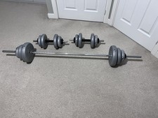 York weight training set: bar with plates and  two dumbbells