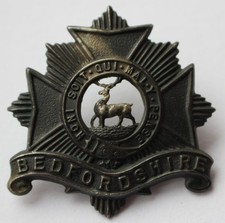 British Army, The Bedfordshire Regiment Cap Badge. Painted Black. (O80)