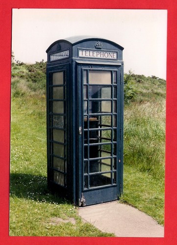 Photo blue telephone box - -,