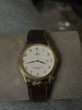 Vintage Lorus Gold Tone Date