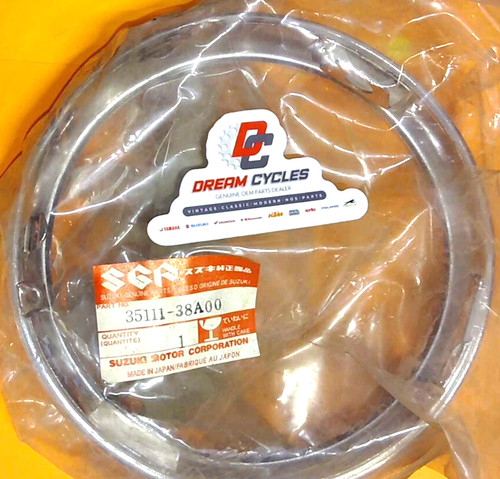 Nos oem suzuki - headlight, rim