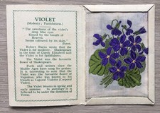 A Kensitas Wix Cigarette Silk Flowers 1st Series Medium Violet Orange Variation