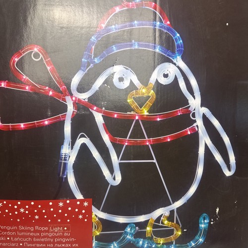 Christmas penguin skiing rope