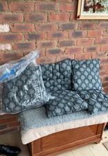 High back garden chair cushions x 4. Unused. Can be separated by zips.