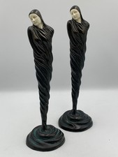 2x Antique decorative sculpture made of bronze cloaked figure swirling base