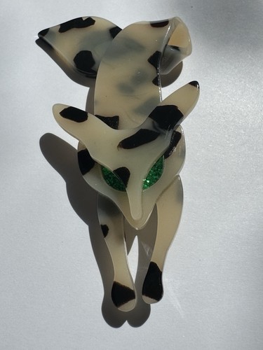 Cream and black animal print - and,