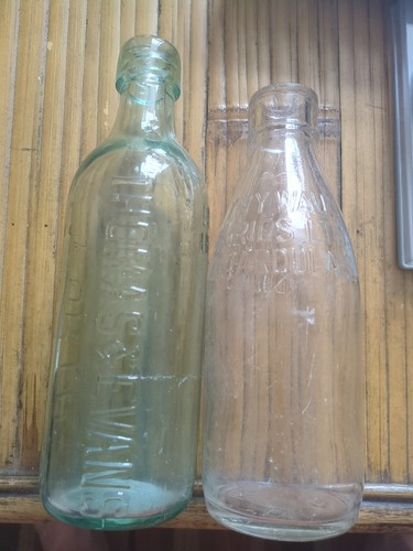 Two vintage glass bottles - glass, milk