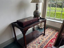 A Chinese Hardwood console table with handles