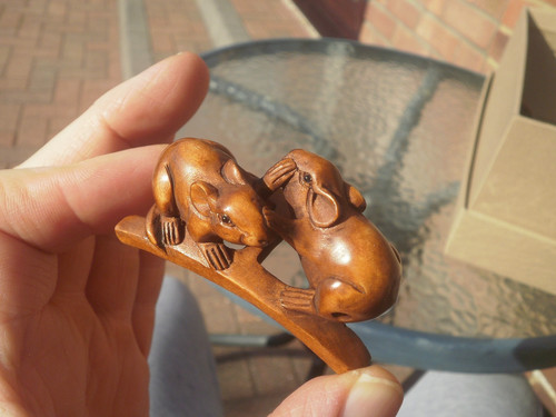 Hand carved wood - hand, mice