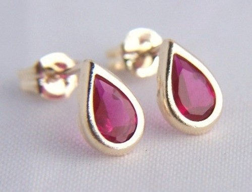 9ct yellow gold ruby studs - yellow,