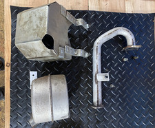 Exhaust Muffler + Heat Shield