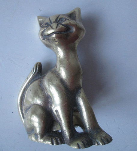 Vintage brass cat ornament.