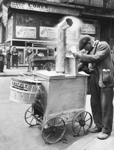 Roast corn man peering - , into
