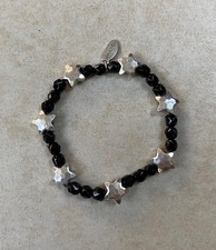 Hult Quist black stretch beaded bracelet with silver stars