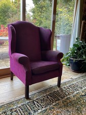 pair of high back wing armchairs antique