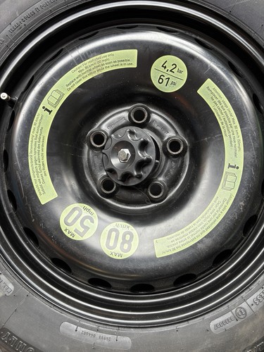 Unused space saver spare - , wheel