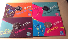 royal mint carded olympic 50p coins-weightlifting,athletics,rowing and table ten