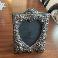 Ornate silver photo frame with
