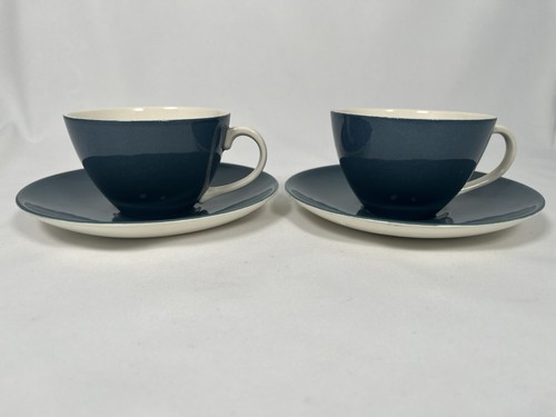 Poole pottery cup and - cup,