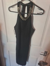 Little Black dress open Back gold detail Neckline halterneck size Small