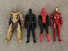 Marvel Superhero figures x 4 (Thanos, Blank Panther, Spiderman, Iron Man)