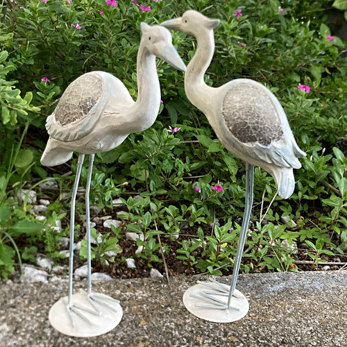 Pair resin and metal heron - and,