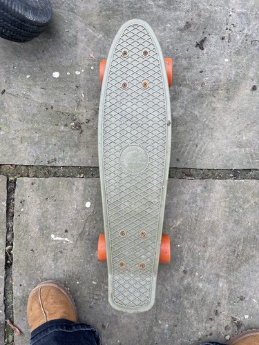 Two bare feet penny - long, board