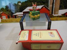 ROYAL DOULTON.BUNNYKINS. " SANTAS LITTLE HELPER " BURSTING OUT A BOX. No: DB192.