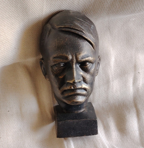 Black metal male head bust - black,
