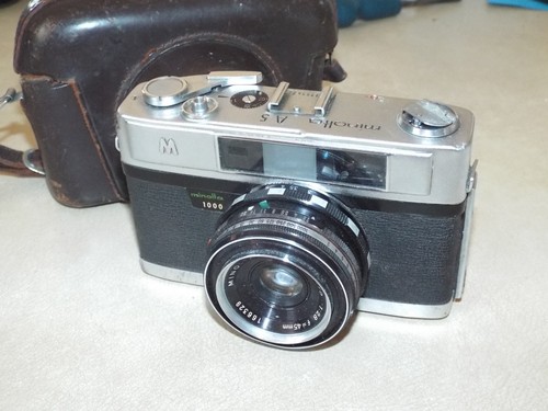 Vintage minolta 35mm film - a5,