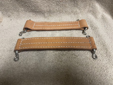 A SET OF NEW BEIGE LEATHER