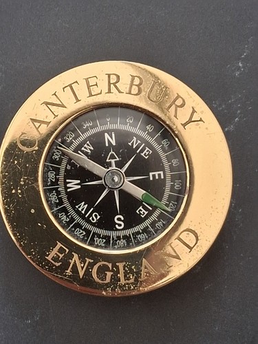 Brass cased compass inscribed - cased,