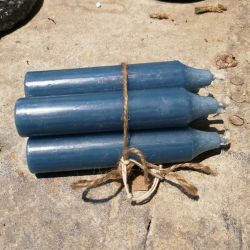 Bundle blue candles tied - of,