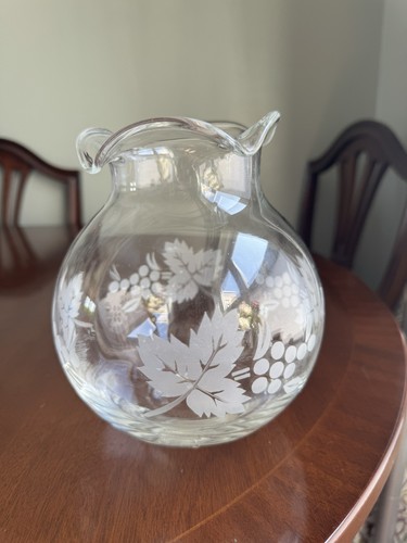 Etched glass globe vase