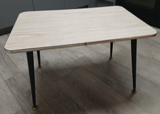 vintage coffee table with atomic legs