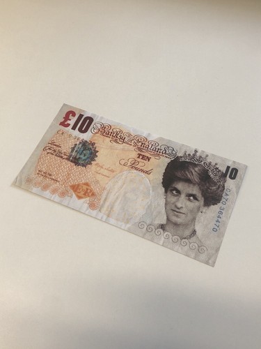 Banksy faced tenner - banksy,