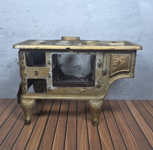 Antique cast iron toy cook - cast,