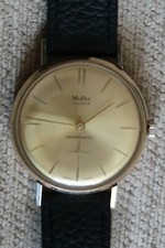 9CT GOLD MUDU MENS WATCH 17