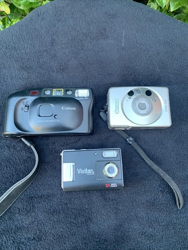 Three vintage cameras - three,