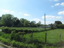 Photo 6x4 Grazing land at the