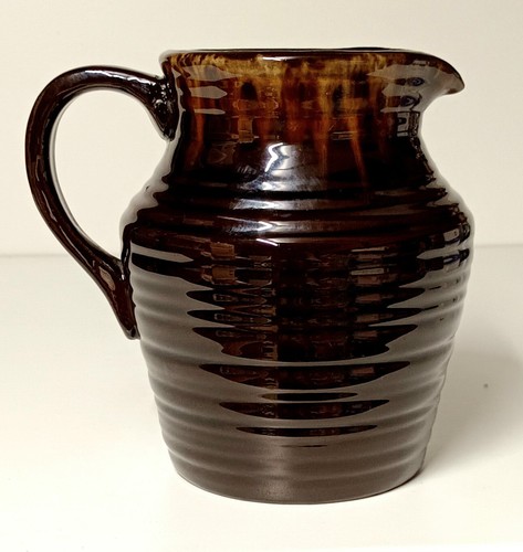 Brown glazed ribbed pottery - glazed,