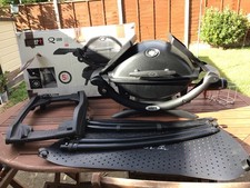 WEBER GAS Q1200 WITH STAND  - NEARLY NEW, USED ONLY WHEN TESTED THE UNIT