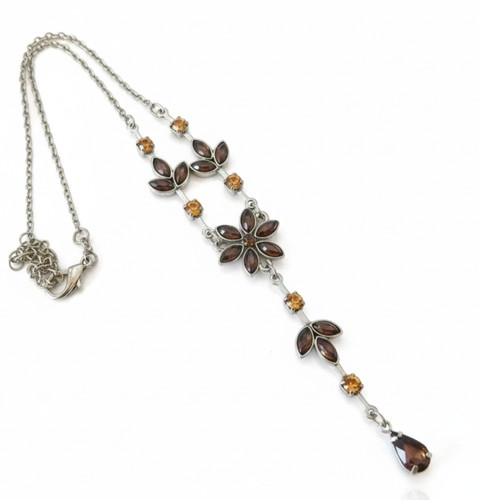 Brown and amber coloured - and, stone