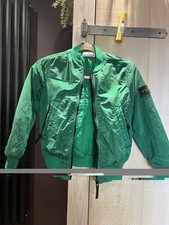This is a green Stone Island