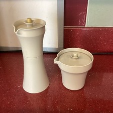 2 Small Tupperware Jugs With
