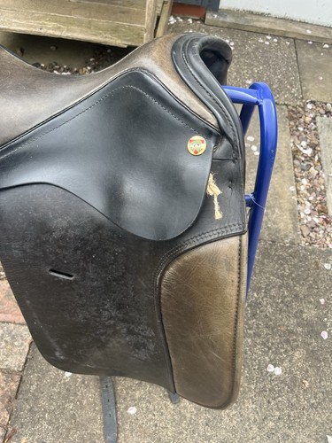 Dressage saddle and n dark - saddle., k